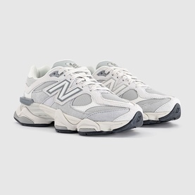 New Balance 9060 trainers in Lone Star Grey, featuring mesh and suede upper, silver N logo, chunky off-white midsole and grey outsole