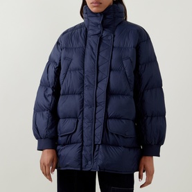 Model wearing HIGH dark blue quilted puffer coat with high neck, concealed placket and oversized patch pockets