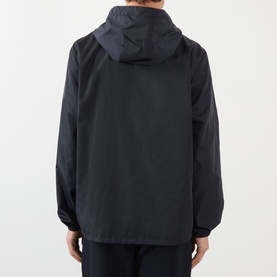 Model wearing Valentino dark marine casual jacket, rear view showing hood and lightweight polyamide construction