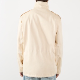 Model wearing Valentino sea shell cotton casual jacket, back view, showing high collar, epaulettes and relaxed fit