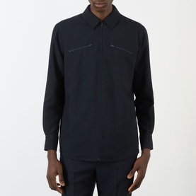 Model wearing Valentino Chest Pocket Zip Overshirt in storm blue, with point collar, front zip closure and twin zip chest pockets