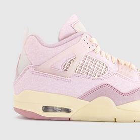Nike Air Jordan 4 women's trainer in Iced Carmine, pink terry cloth upper with cream midsole and Air unit, close-up detail shot
