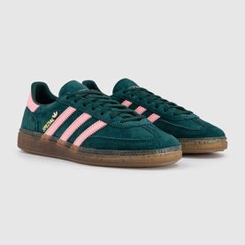 Adidas Handball Spezial trainers in collegiate green and pink, three-stripe detail, gum sole, suede upper