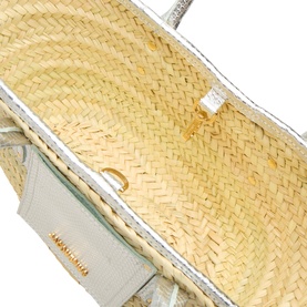 Jacquemus Le Petite Panier Soli Basket Bag in silver, showing woven palm leaf interior, gold-tone clasp closure and metallic leather panel detail