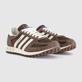 Adidas trainer in Earth Strata Brown, suede and mesh upper, three off-white stripes, cream midsole, chunky brown waffle outsole