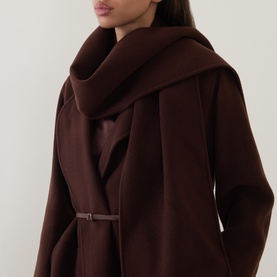 Model wearing Luisa Cerano dark brown hooded wrap coat with oversized draped hood and slim belt detail at waist.