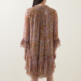 Model wearing Luisa Cerano Tiered Floral Print Mini Dress in multi, showing tiered ruffle skirt, flared cuffs and semi-sheer floral print from behind.