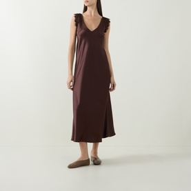 Model wearing Luisa Cerano Dark Brown midi dress with V-neck, ruffle shoulders and side split, styled with taupe flat mules.