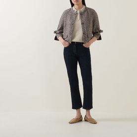 Model wearing Luisa Cerano Straight Leg Jeans in dark blue with tobacco stitching, styled with a tweed jacket and cream blouse