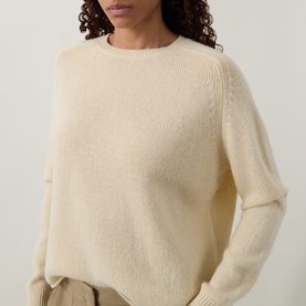 Model wearing Luisa Cerano Fine Knit Sweater in yellow, crew neck, long raglan sleeves, ribbed trims, fine wool-cashmere knit