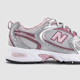 New Balance 530 trainer in silver metallic and rosewood, mesh and synthetic upper, white chunky sole, pink N logo detail