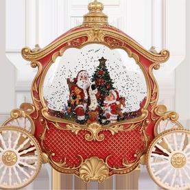 Music Box World Christmas Carriage Snow Globe 26cm, red and gold vintage carriage design with Santa, Christmas tree and child scene inside glass dome