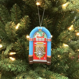 Music Box World Rock-O-Rama Jukebox Musical Christmas Decoration in multi colourway, hanging on a lit Christmas tree, retro diner-style design