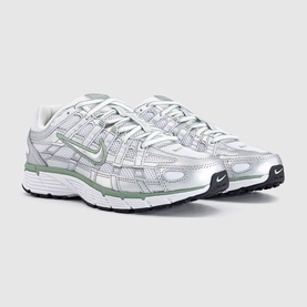 Nike P-6000 trainers in metallic silver and sage green, featuring mesh and synthetic overlays with a chunky white sole.