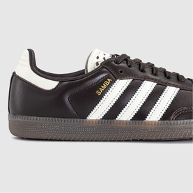 Adidas Samba trainer in Aurora Coffee and Off-White, black leather upper, white stripe detail, gum rubber sole, gold branding