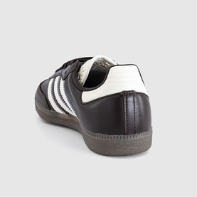 Adidas trainer in Aurora Coffee and Off-White, leather upper with three white stripes, gum sole, heel tab detail