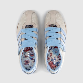 Adidas trainers in Chalk Pearl and Crystal Sky, overhead view showing light blue laces, suede upper, three stripes, and floral print insole.