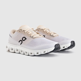 On Running trainers in Sand Wolf, lightweight knit upper, white CloudTec sole, black logo detail, lace-up fastening