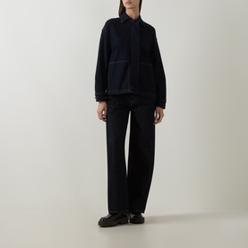 Model wearing Elena Miro Patch Pocket Denim Overshirt in dark blue with black wide-leg trousers and black loafers.