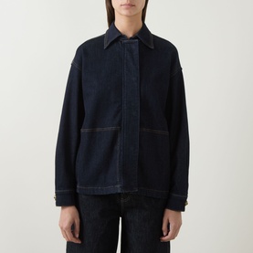 Model wearing Elena Miro Patch Pocket Denim Overshirt in dark blue with tobacco stitching, patch pockets, point collar, styled with dark denim jeans.