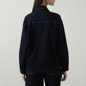 Model wearing Elena Miro Patch Pocket Denim Overshirt in dark blue with tobacco stitching, shown from the back.