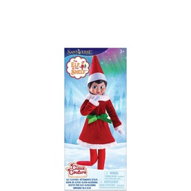 Elf on a Shelf girl elf doll in red dress with white trim and green belt, shown in branded box packaging.