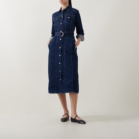 Model wearing Gant Dark Wash denim midi shirt dress with belt and patch pockets, styled with black ballet flats.