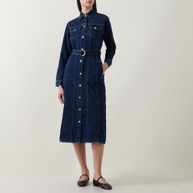 Model wearing Gant Dark Wash denim midi shirt dress with belt and button-front detail, styled with black flat shoes.