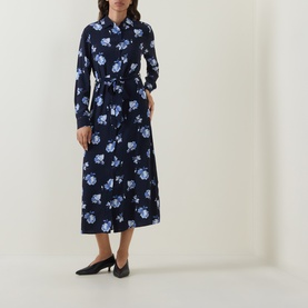 Model wearing Gant blue floral print midi shirt dress in viscose, styled with black kitten heel mules.