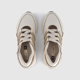 Adidas trainers in Wonder White and Wonder Beige, mesh upper with tan overlays, chunky cream sole, top-down view
