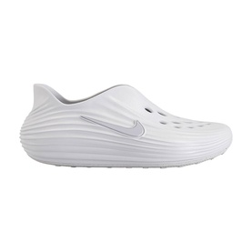 Nike slip-on clog shoe in vast grey, featuring ribbed sole, swoosh logo, and rounded toe, shot on white background