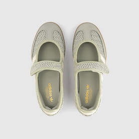 Adidas slip-on trainers in Halo Green and Warm Vanilla, overhead view showing woven upper, velcro strap, and cream sole