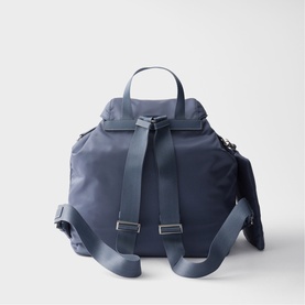 Prada Accessories blue nylon backpack, rear view showing padded shoulder straps, top carry handle and silver-tone hardware.