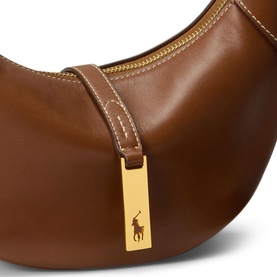 Polo Ralph Lauren shoulder bag in Cuoio tan leather, gold-tone Polo Pony charm, contrast stitching detail and zip closure.