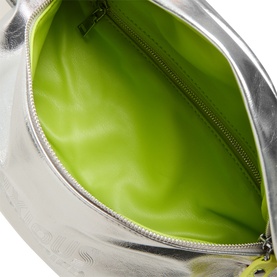Anxious Preoccupied The Oversized Belt Bag in silver metallic, open to show lime green contrast lining with gold-tone zip detail.