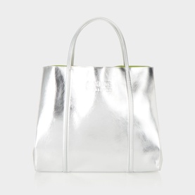 Anxious Preoccupied The Oversized Logo Tote Bag in silver and lime green metallic finish, dual shoulder straps, debossed logo, snap-button closure