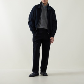 Model wearing Aspesi Solid Half-Zip Sweater in grey with navy bomber jacket, black trousers and dark loafers.