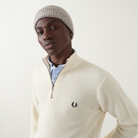 Model with Aspesi Rib-Knit Beanie Hat in Dove Grey, wool rib-knit with turn-up hem, styled with a cream zip-neck jumper