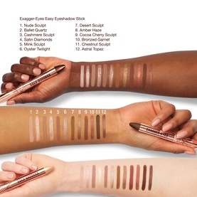 Charlotte Tilbury Exagger-Eyes Easy Eyeshadow Stick swatches in 12 shades shown on two arms with varying skin tones, Cashmere Sculpt highlighted