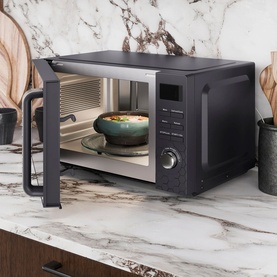 Morphy Richards Cassini 20L 800w Black microwave on marble countertop, door open with bowl inside, dark kitchen setting