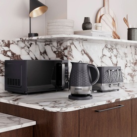 Morphy Richards Cassini Microwave 20L 800w Black on marble worktop, styled with matching black kettle and toaster in a modern kitchen