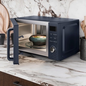 Morphy Richards Cassini 20L 800w Navy Microwave on marble countertop, door open showing bowl inside, dark wood kitchen setting