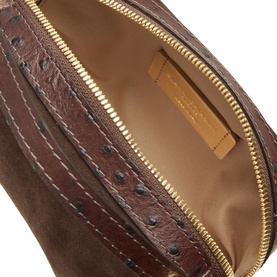 Gianni Chiarini brown suede crossbody bag interior view, showing gold-tone zip, tan lining and ostrich-effect leather trim detail.
