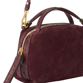 Gianni Chiarini burgundy suede crossbody bag with gold-tone zip and hardware, dual top handles and adjustable shoulder strap