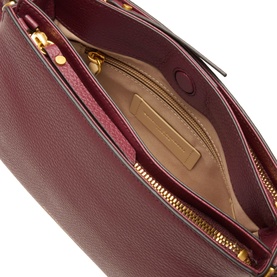 Gianni Chiarini antique ruby leather crossbody bag, open view showing beige interior lining and gold-tone zip detail