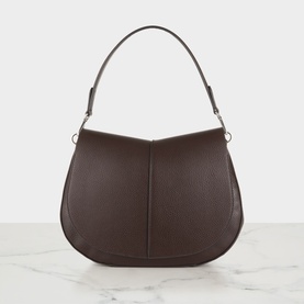Gianni Chiarini brown leather shoulder bag with curved saddle silhouette, centre seam detail, and single adjustable strap with silver hardware