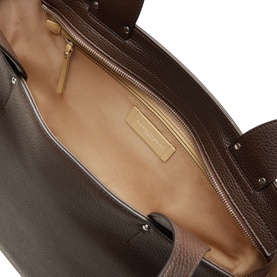 Gianni Chiarini brown leather tote bag interior, showing zip pocket, nude lining and gold-tone hardware detail.