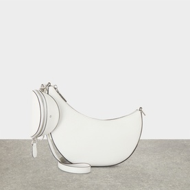 Kate Spade True White leather crossbody bag, crescent shape, silver-tone hardware, with matching mini pouch and adjustable strap