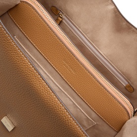 Kate Spade Deco Large Shoulder Bag in Garden Soil. Interior view showing zip pocket, card slots, and beige lining with gold-tone hardware detail.