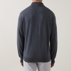 Model wearing Peter Millar Autumn Half-Zip Sweater in charcoal, back view showing funnel neck, long sleeves and ribbed trims, styled with light grey